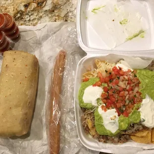 Egg/Potato/Cheese/Guac burrito, Churro and Asada Nachos