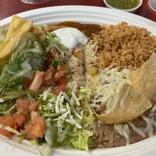 #1 Combination - crispy shredded beef taco and cheese enchilada with rice and beans