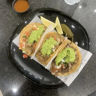 Two carne and one tripa taco