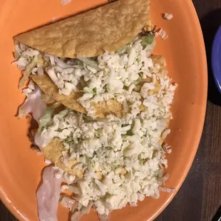 a plate of rice and a tortilla