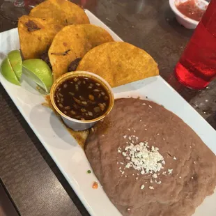 Birria Tacos no rice with refried beans