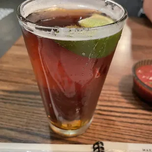 a drink in a tall glass
