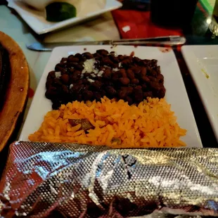 Chori steak with rice, beans and tortillas