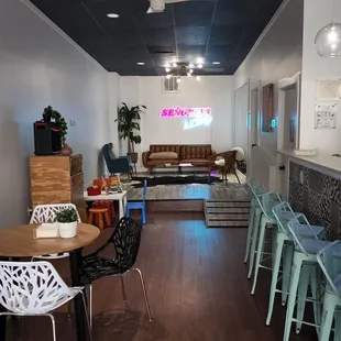 Wonderful chill atmosphere with space to stretch out on the couch and relax or hang at the bar.