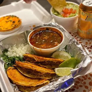Birria tacos with consomme