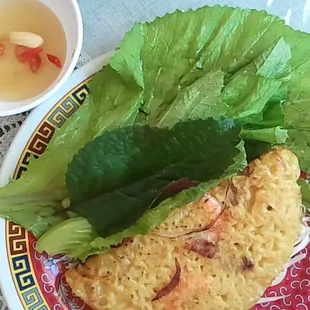 Banh Xeo - Dinner. Crunchy &amp; healthy with lots of greens. Was at widow&apos;s home.