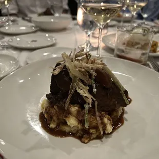 Brasato di Manzo, short rib, polenta, and fried leeks. tasty and very rich dish.