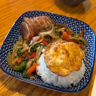 My no.1 recommend , Duck basil with fried egg on top of Jasmin's rice