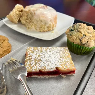 Cranberry lemon bar, blueberry muffin, chocolate chip cookie, cinnamon bar