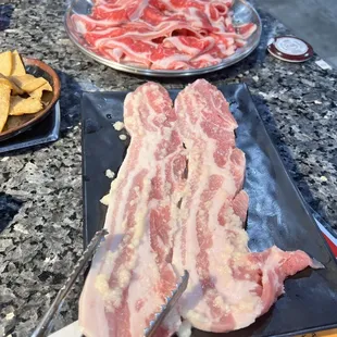 Garlic pork belly, brisket in back