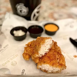 Bucket O' Tenders - Four jumbo tenders, asian slaw, pickled radish, 2 sauces.