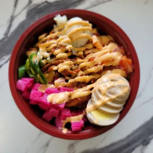 Japchae bowl with spicy pork.