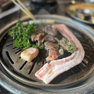 a plate of food on a grill