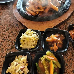 Chulpan squid stir-fry with rice cakes and side dishes