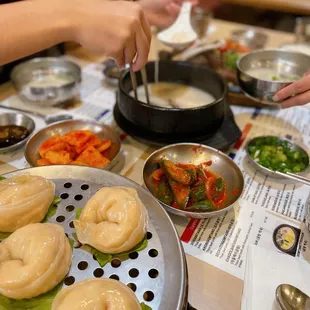 Jinmandu (Steamed Dumpling), Chadolbaegigomtang (Thick Beef Broth with Throughly Cooked Beef Brisket)