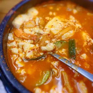 Spicy tofu soup with seafood.
