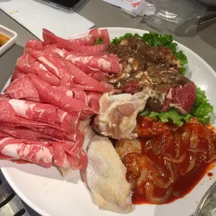 Brisket, chicken wings, baby octopus, bulgogi.