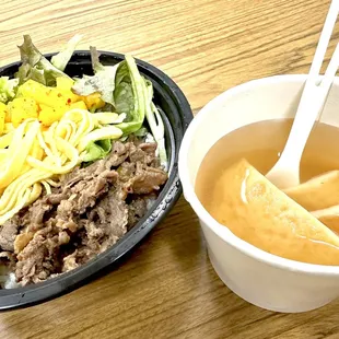 a bowl of soup and a bowl of noodles