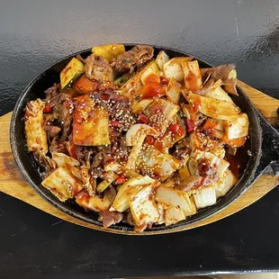 Bulgogi beef dish with savory hot peppers, cabbage and grilled beef.