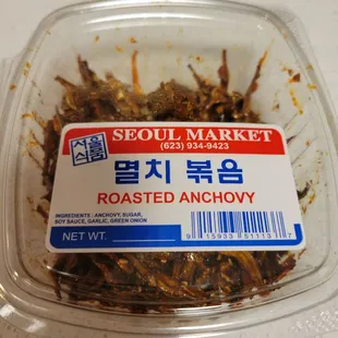 a container of roasted anchovy