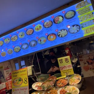 a food stand with a variety of food items