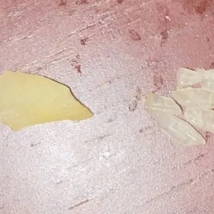 a piece of butter left on a table