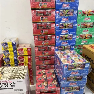a stack of boxes of noodles