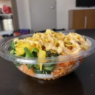 a bowl of noodles and shrimp