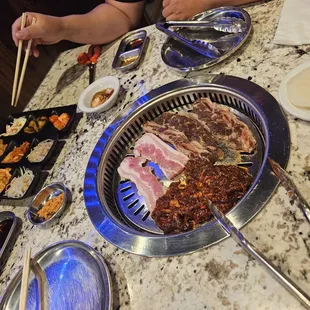 Raw proteins: Bbq short ribs, pork belly, and beef brisket. Add ons: radish wrap