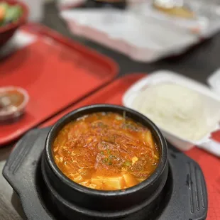 a bowl of soup on a tray