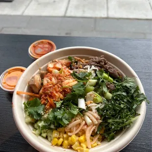 a bowl of noodles and vegetables