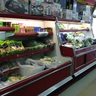 Fresh vegetables and assortment of packaged goods