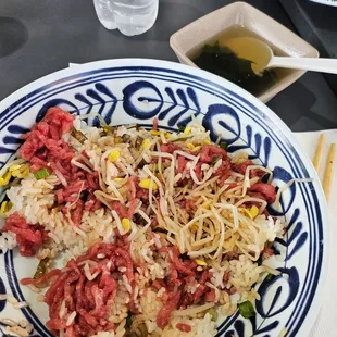 Beef tartare bibimbop with bean sprouts rice mixed