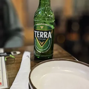 a bottle of terra beer on a table