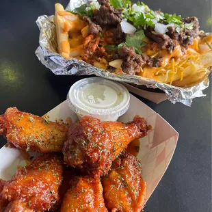 Hot bokki wings and kimchi fries