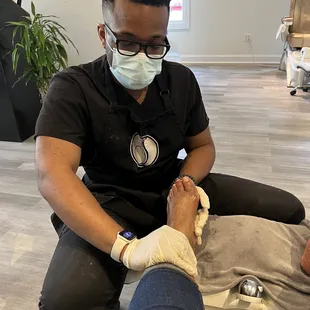 Zach is getting my feet ready for the wkend!