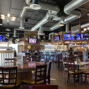 The bar (on the right) and the dining area with tall tables on the left!