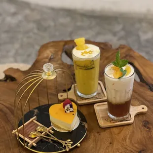 Passion fruit cheesecake, mango jasmine macchiato, and the milky peach tea