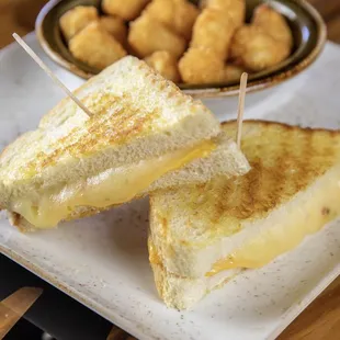 a grilled cheese sandwich with pickles