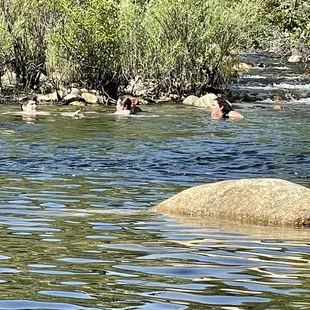 Flowing river and the kids enjoying it