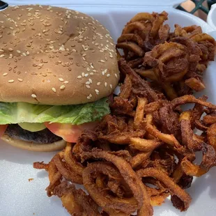 Hamburger and curly fries. Fries are so over cooked, it's inedible.