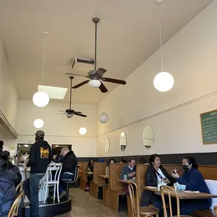 booths and bar area, light jazz music playing in the background