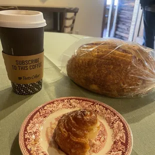 Latte, sourdough bread and a sugar snail!