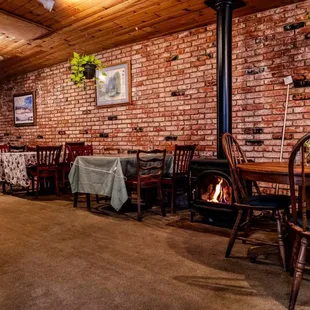 Cozy seating inside by the fireplace.