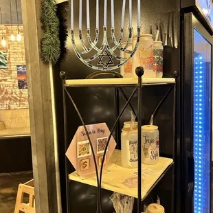 Inclusive owner a Xmas tree &amp; Hanuka menorah.