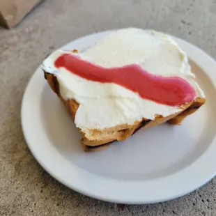 Ricotta and strawberry jam on brioche