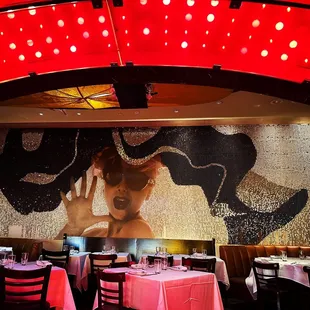 a mural of a woman on the wall