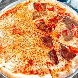 a pizza with pepperoni