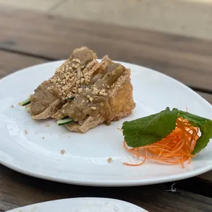 Satay tofu Deep fried tofu stuffed with beansprout, cucumber and peanut sauce