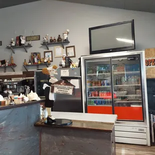 a counter with a refrigerator